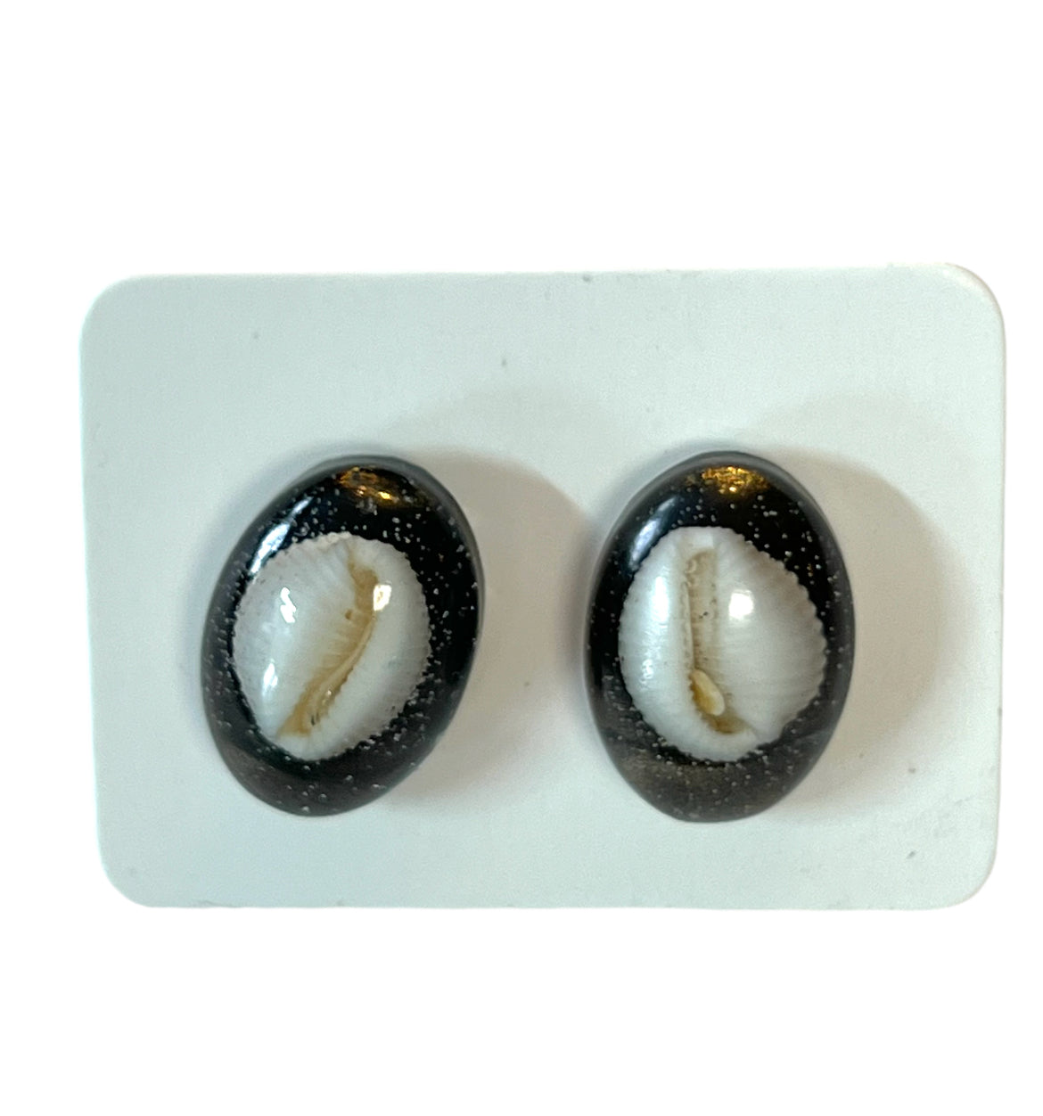 Cowrie Shell studs.