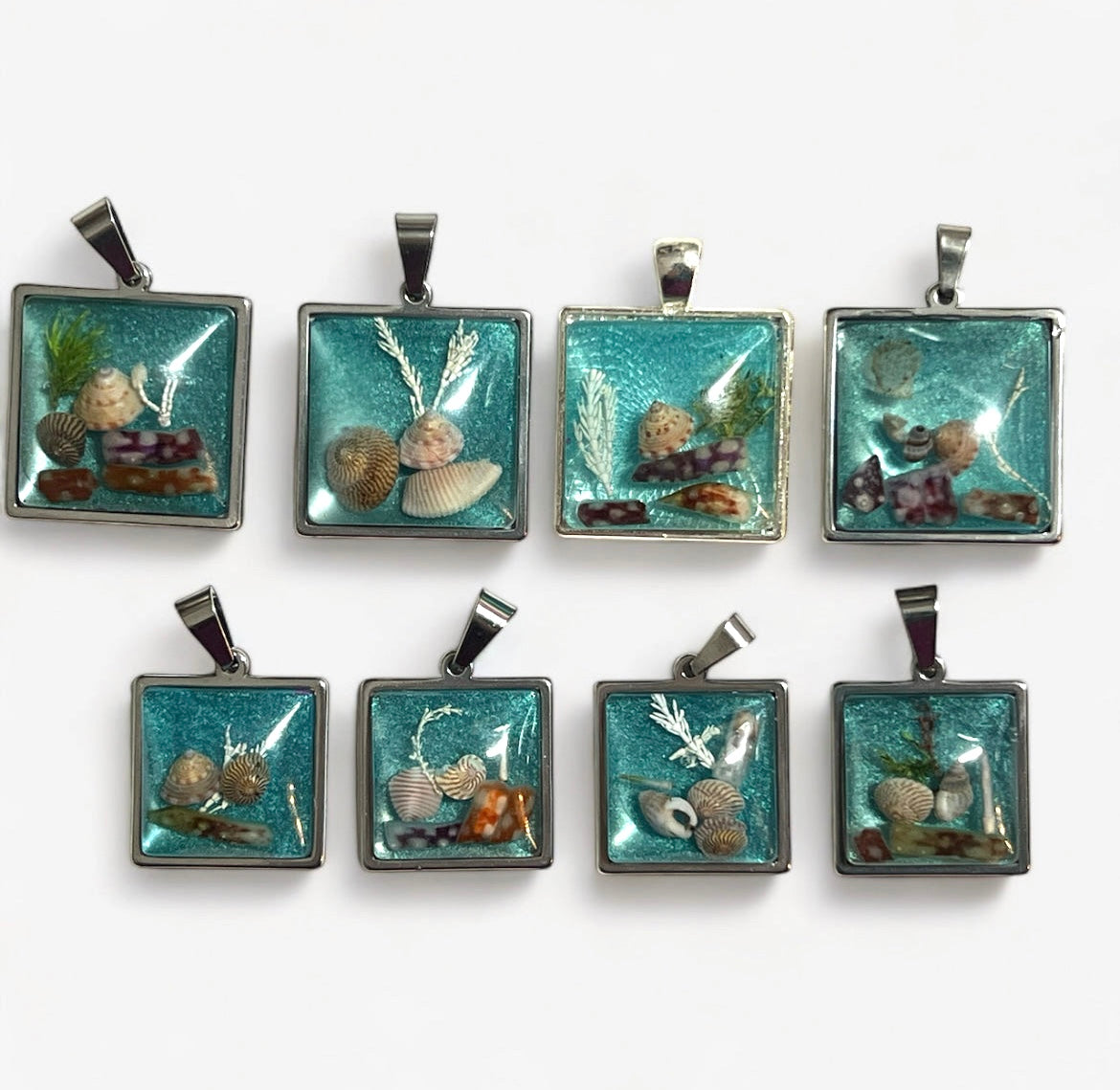 Sea blue beach treasure pendants.