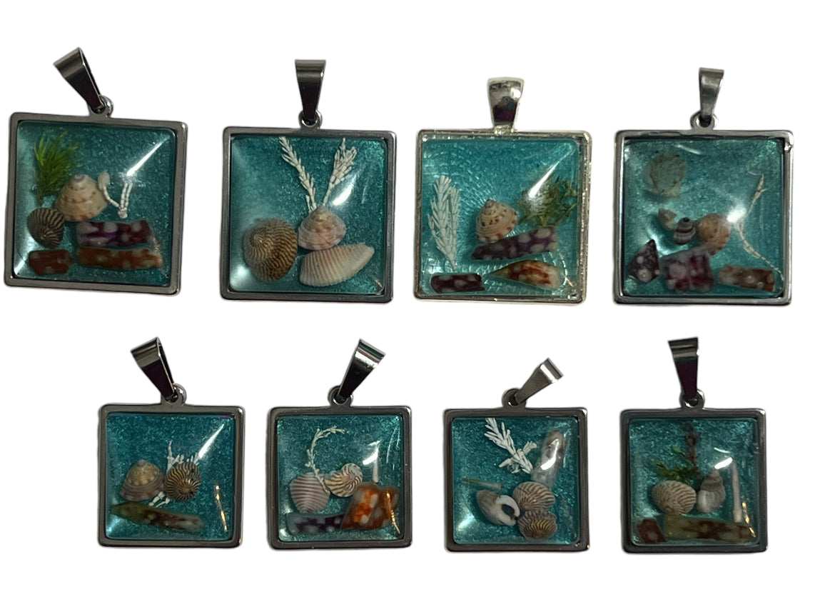 Sea blue beach treasure pendants.